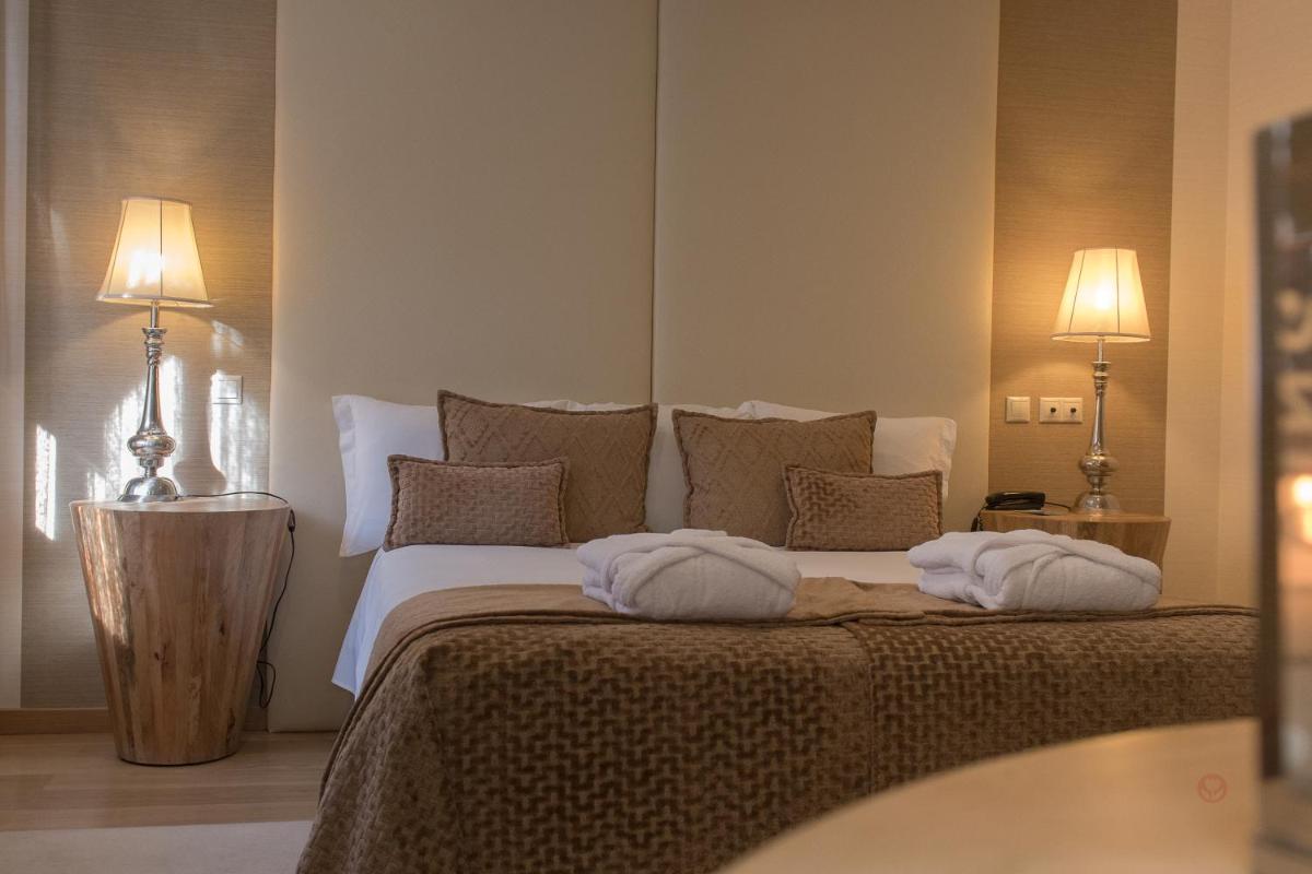 Uma cama ou camas num quarto em Your Hotel & Spa Alcobaça