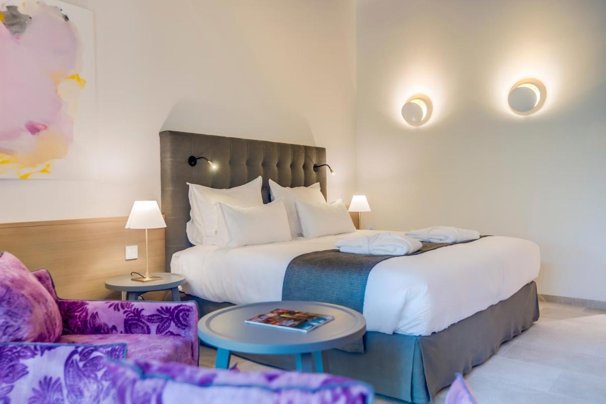 Cama o camas de una habitación en Carrossa Hotel & Spa