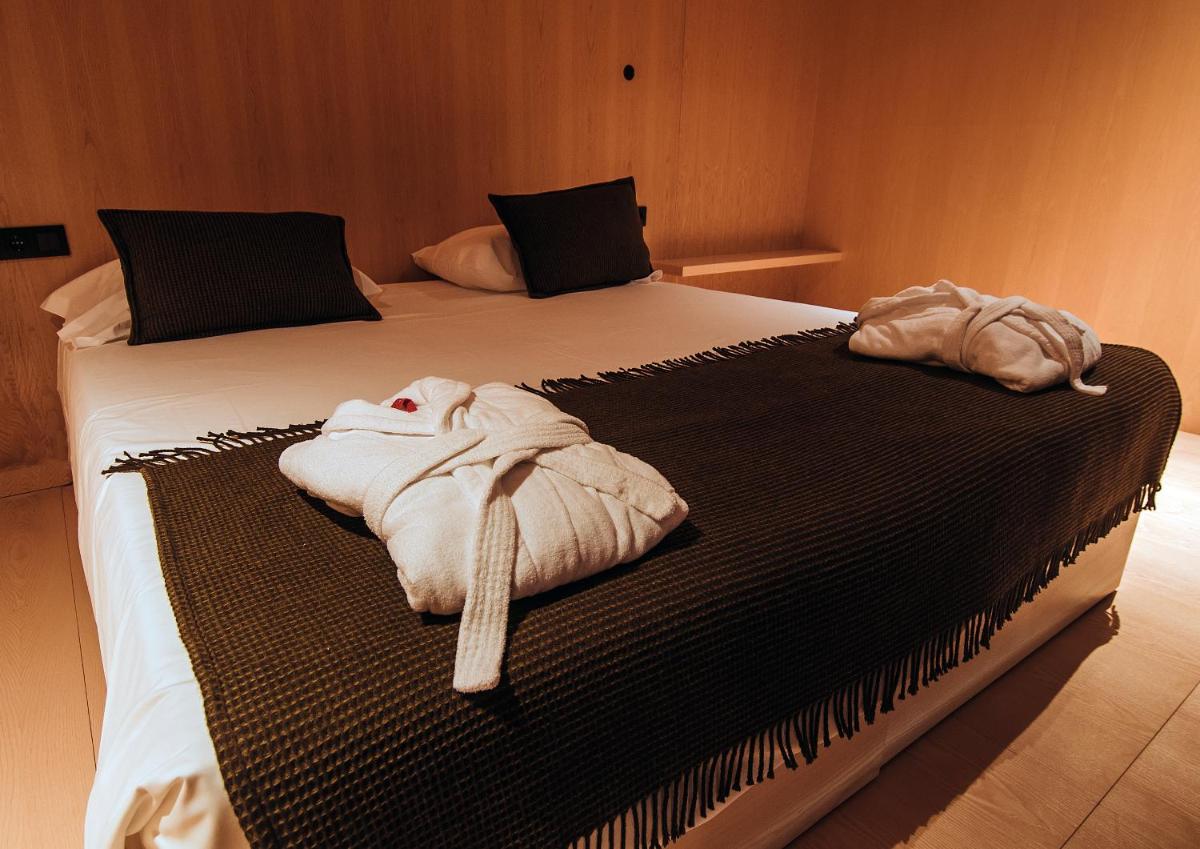 Uma cama ou camas num quarto em Cró Hotel Rural