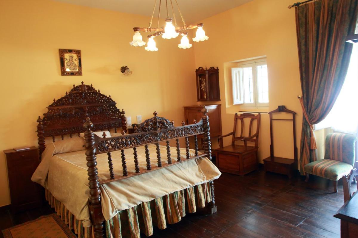 Cama o camas de una habitación en Hotel Monumento Pazo do Castro