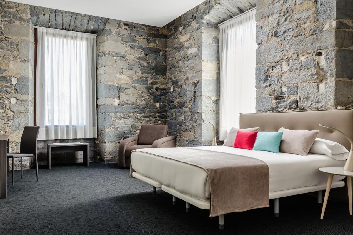 Cama o camas de una habitación en Hotel Balneario Orduña Plaza