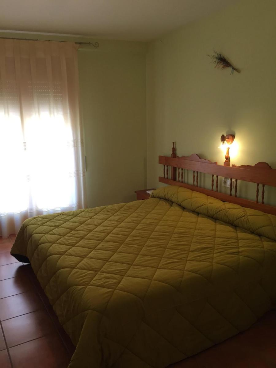 Cama o camas de una habitación en Hotel Castellote