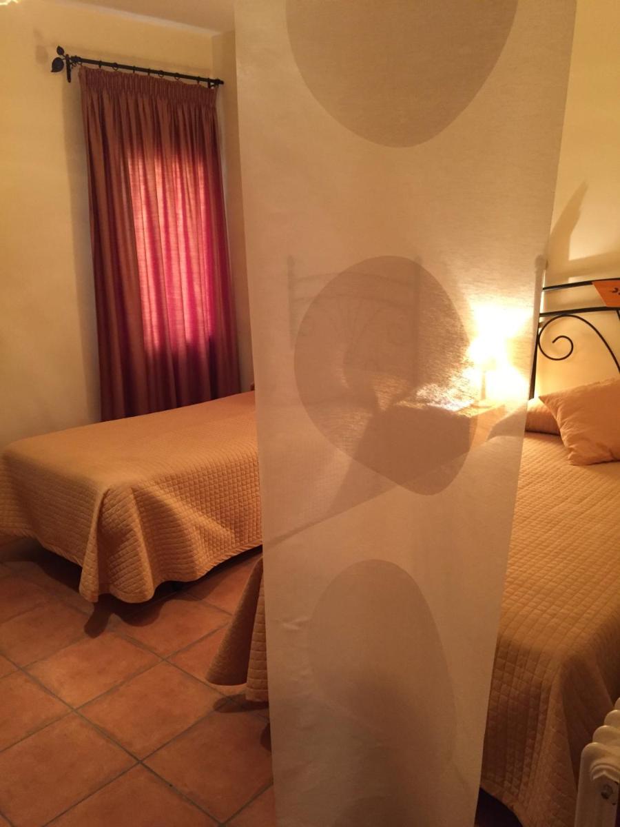 Cama o camas de una habitación en Hotel Castellote