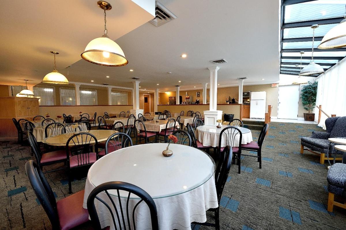 Ambassador Inn and Suites - Housity