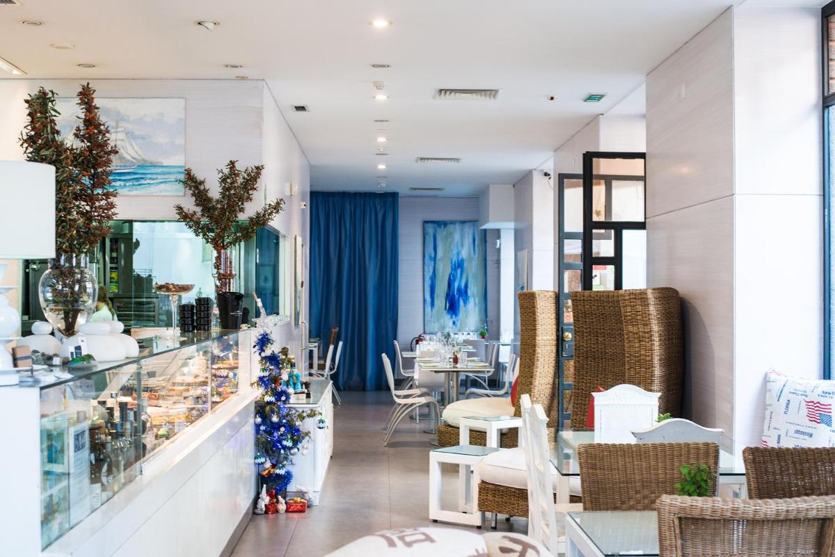 Uma área de estar em Sé Boutique Hotel