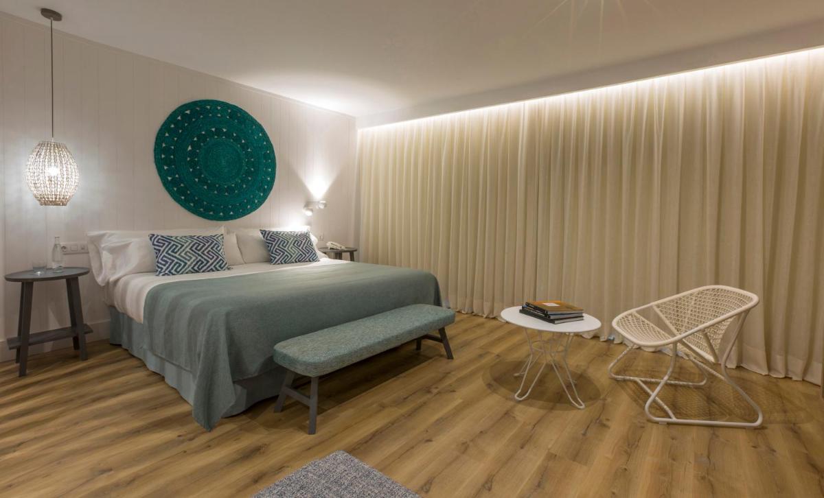 Cama o camas de una habitación en Blaumar Hotel