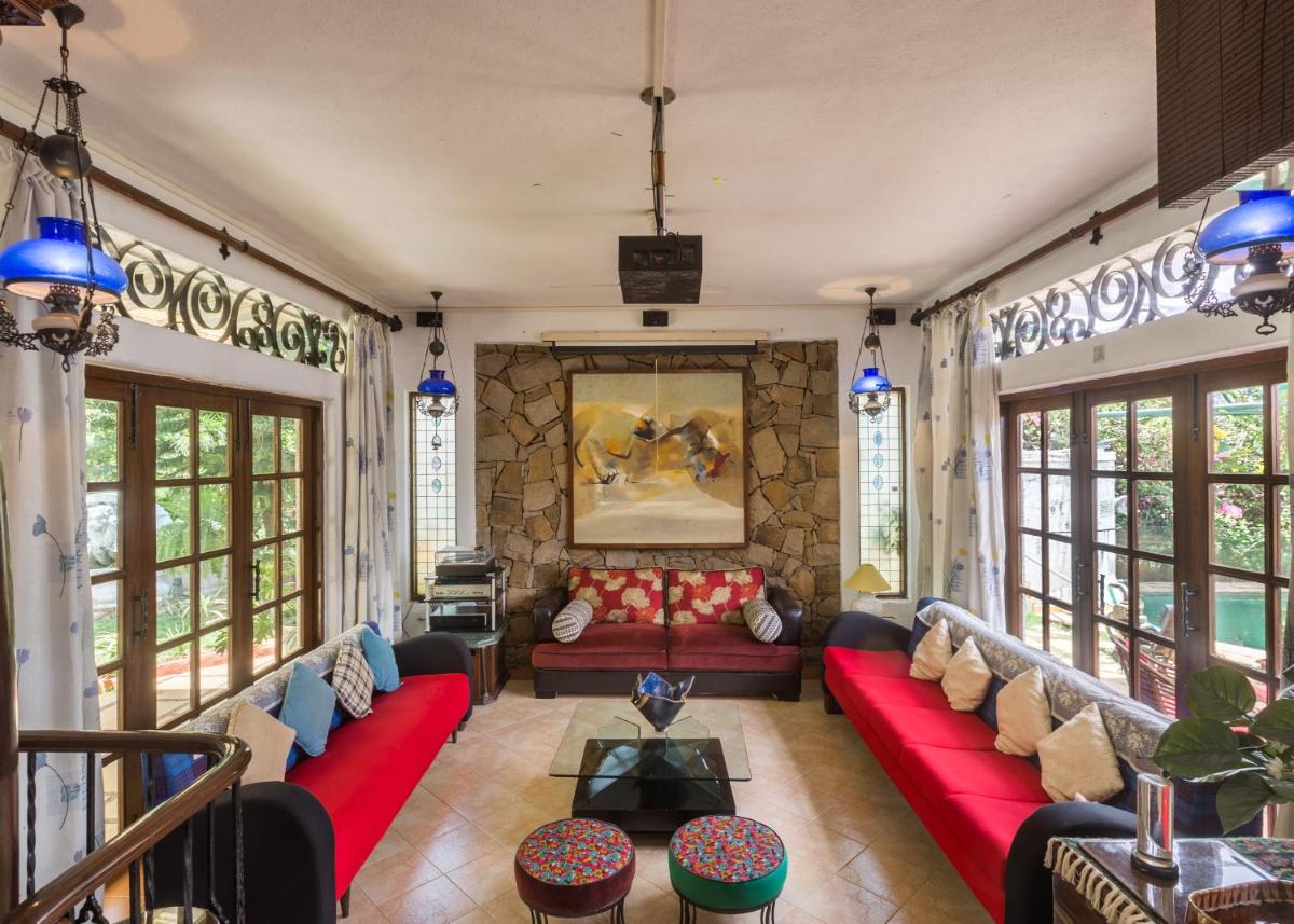 Bella Vista by StayVista - A haven with lush green surroundings, Zen garden, Quirky decor & A inviting swimming pool - Housity