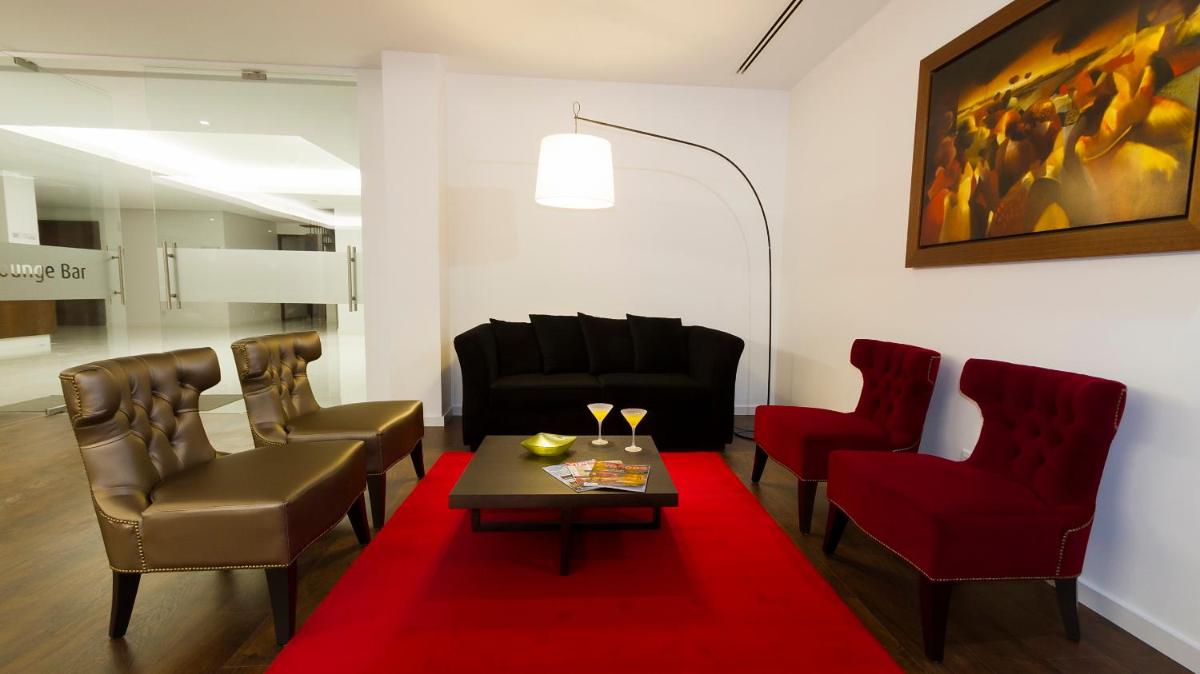 Uma área de estar em Hotel Vila D'Óbidos