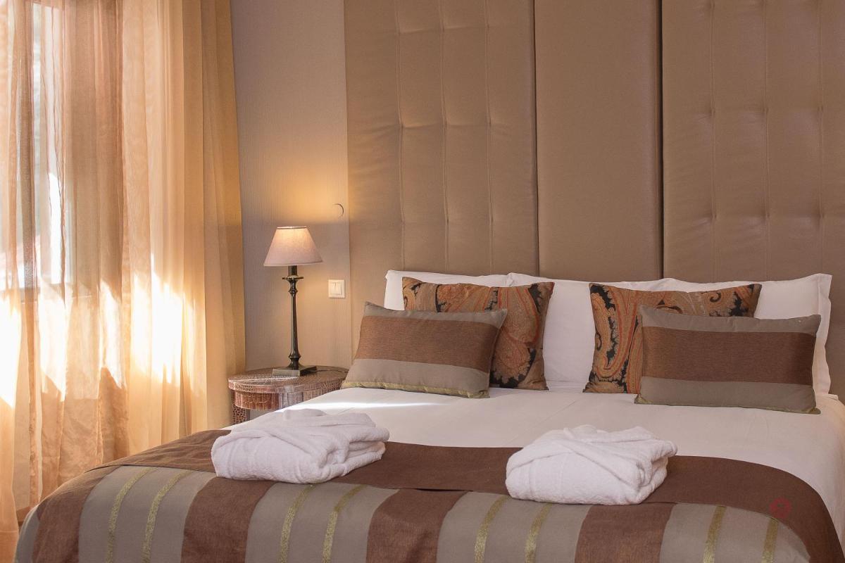Uma cama ou camas num quarto em Your Hotel & Spa Alcobaça