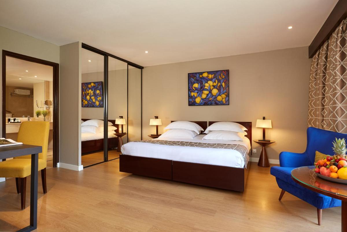 Un ou plusieurs lits dans un hébergement de l'établissement Villa Duflot Hôtel & Spa Perpignan