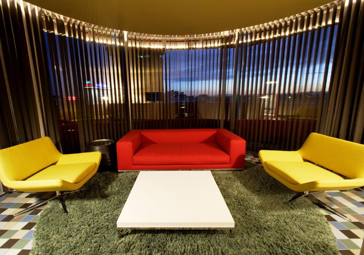 Zona de estar de Hotel Puerta America