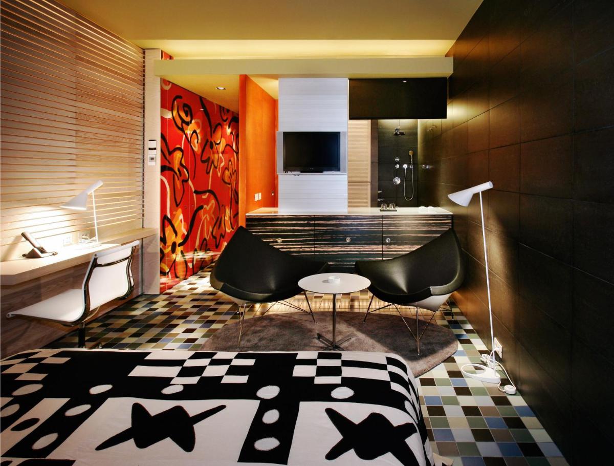 Cama o camas de una habitación en Hotel Puerta America