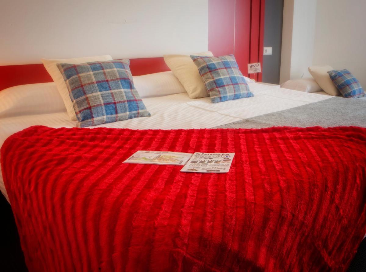 Cama o camas de una habitación en Hotel Spa El Muelle de Suances