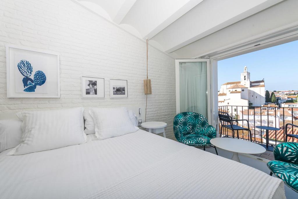 Cama o camas de una habitación en Boutique Hotel Villa Gala by Fimedhotels