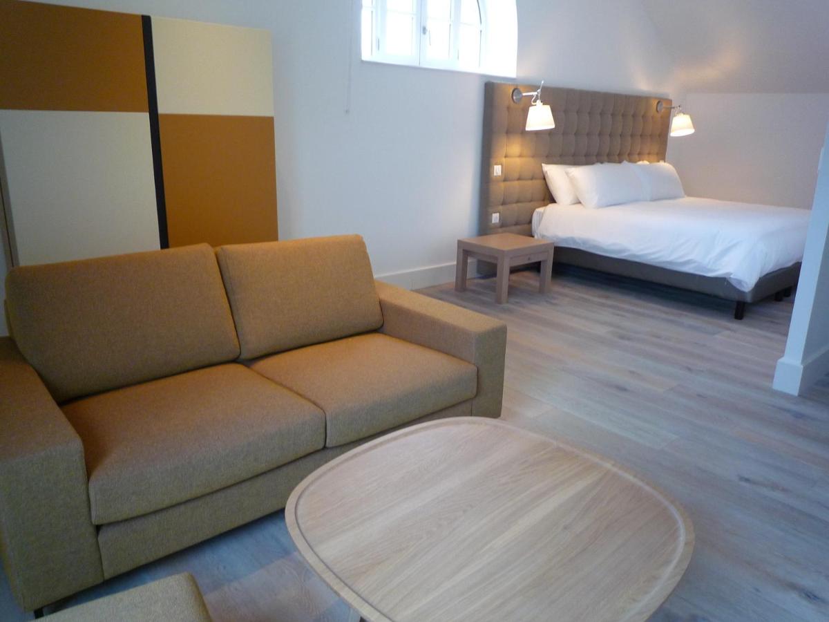 Un ou plusieurs lits dans un hébergement de l'établissement Hôtel Ginkgo - SPA Biloba