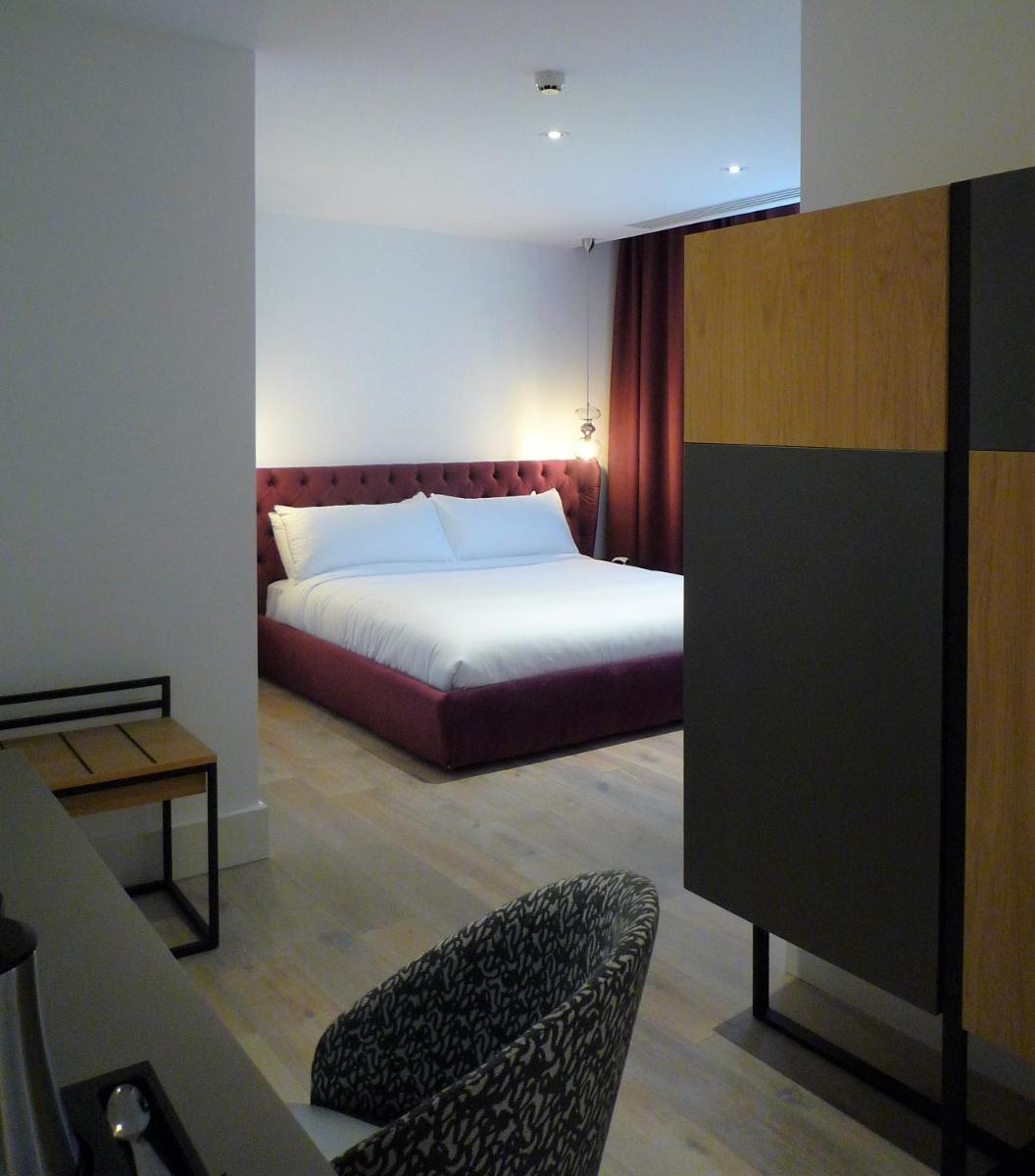 Un ou plusieurs lits dans un hébergement de l'établissement Hôtel Ginkgo - SPA Biloba