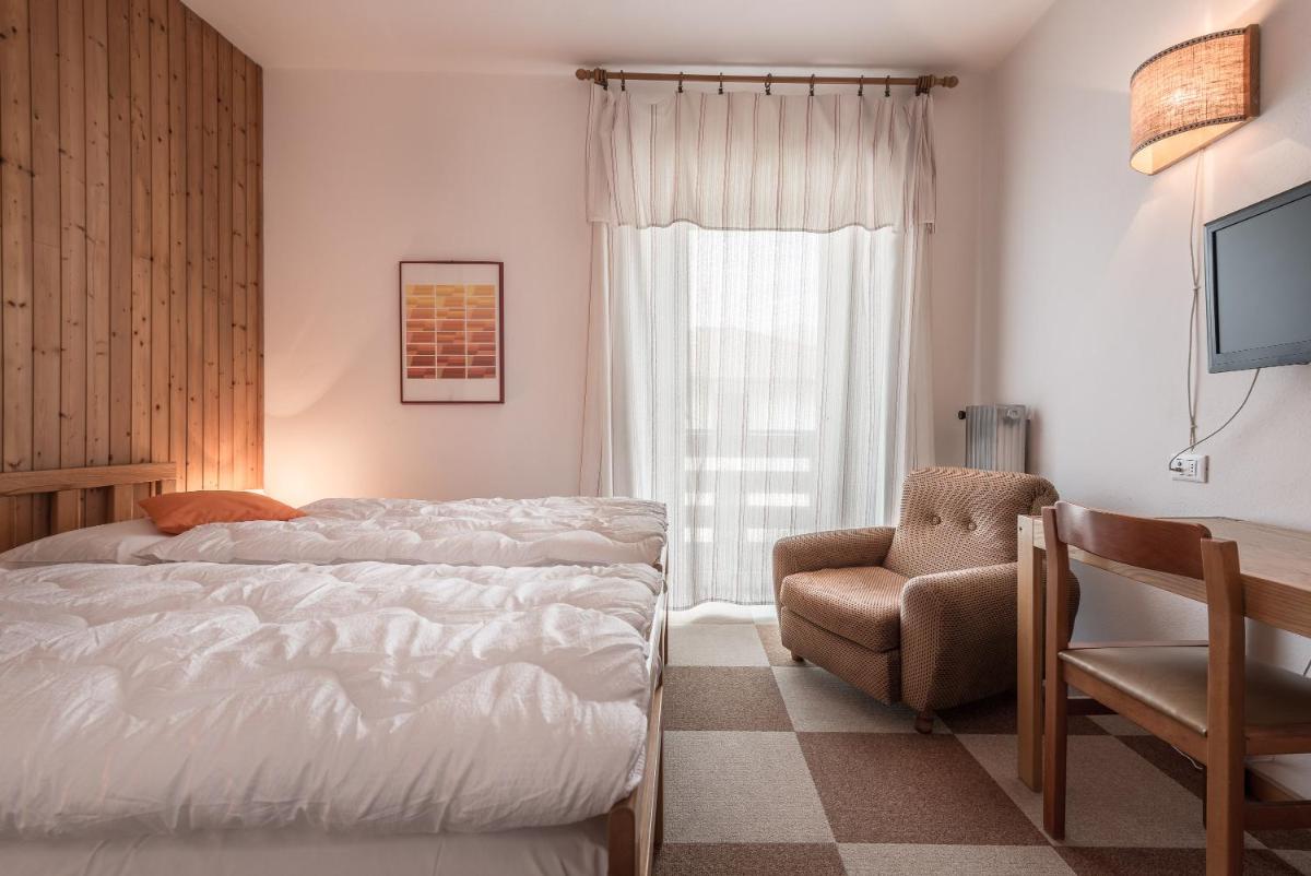 Hotel Tomei - Housity