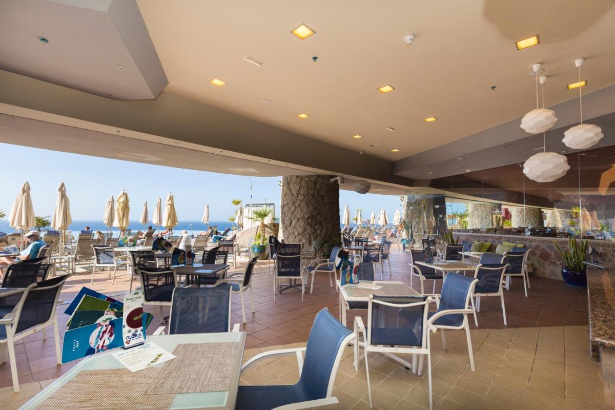 Un restaurante o sitio para comer en Gloria Palace Royal Hotel & Spa