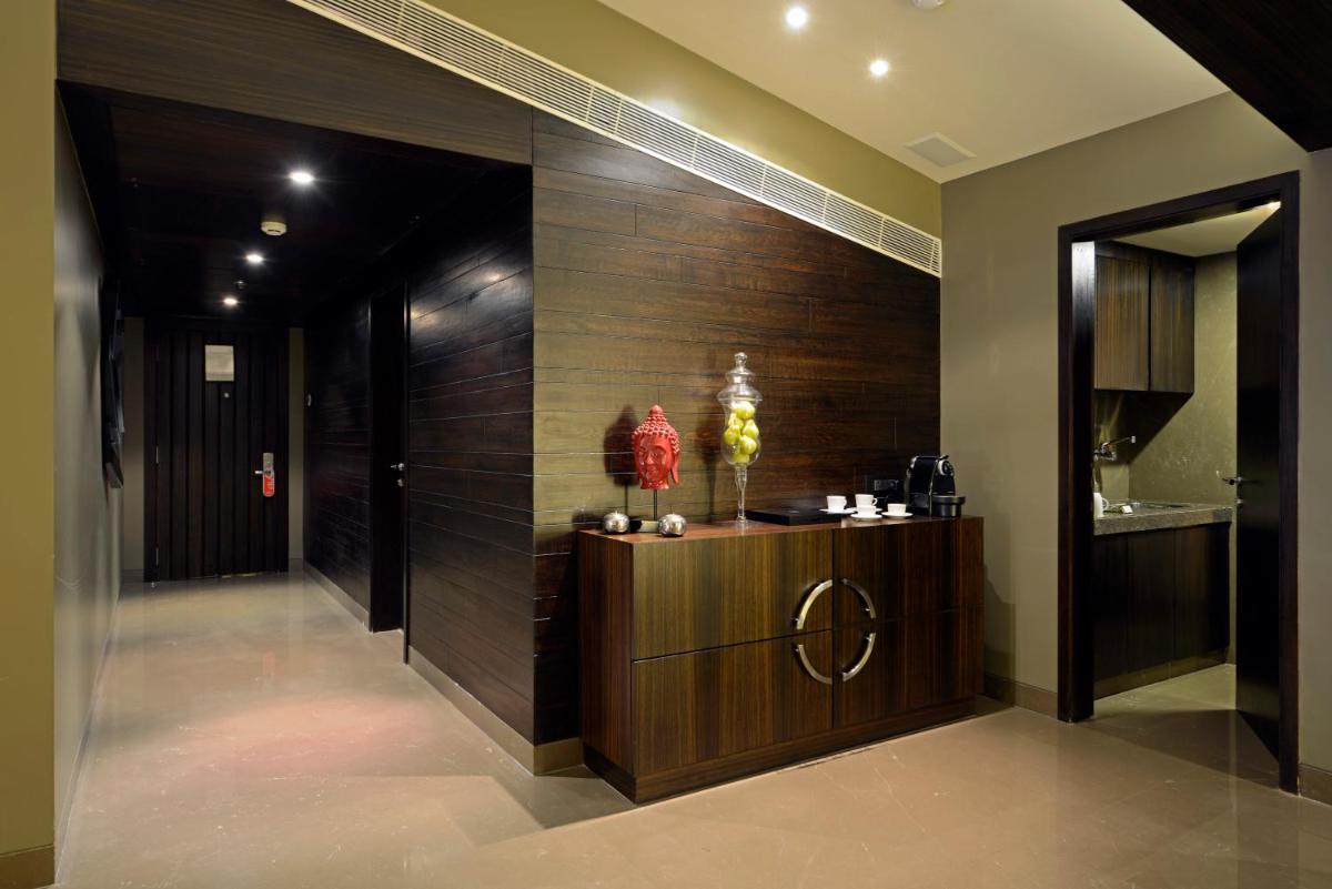 a lobby with a reception desk in a building at Sun-n-Sand Mumbai Juhu Beach in Mumbai