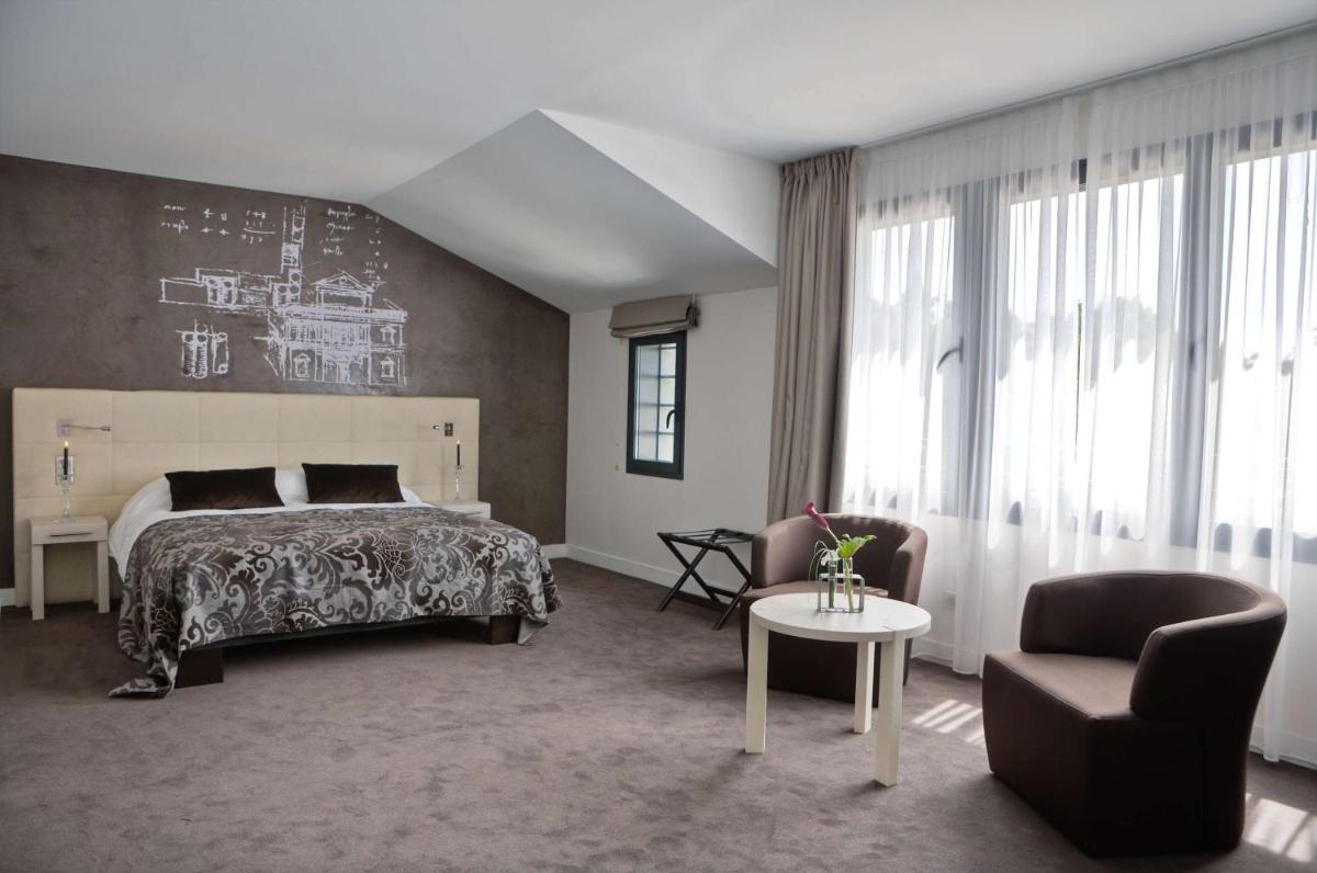 Un ou plusieurs lits dans un hébergement de l'établissement Best Western Plus Villa Saint Antoine Hotel & Spa