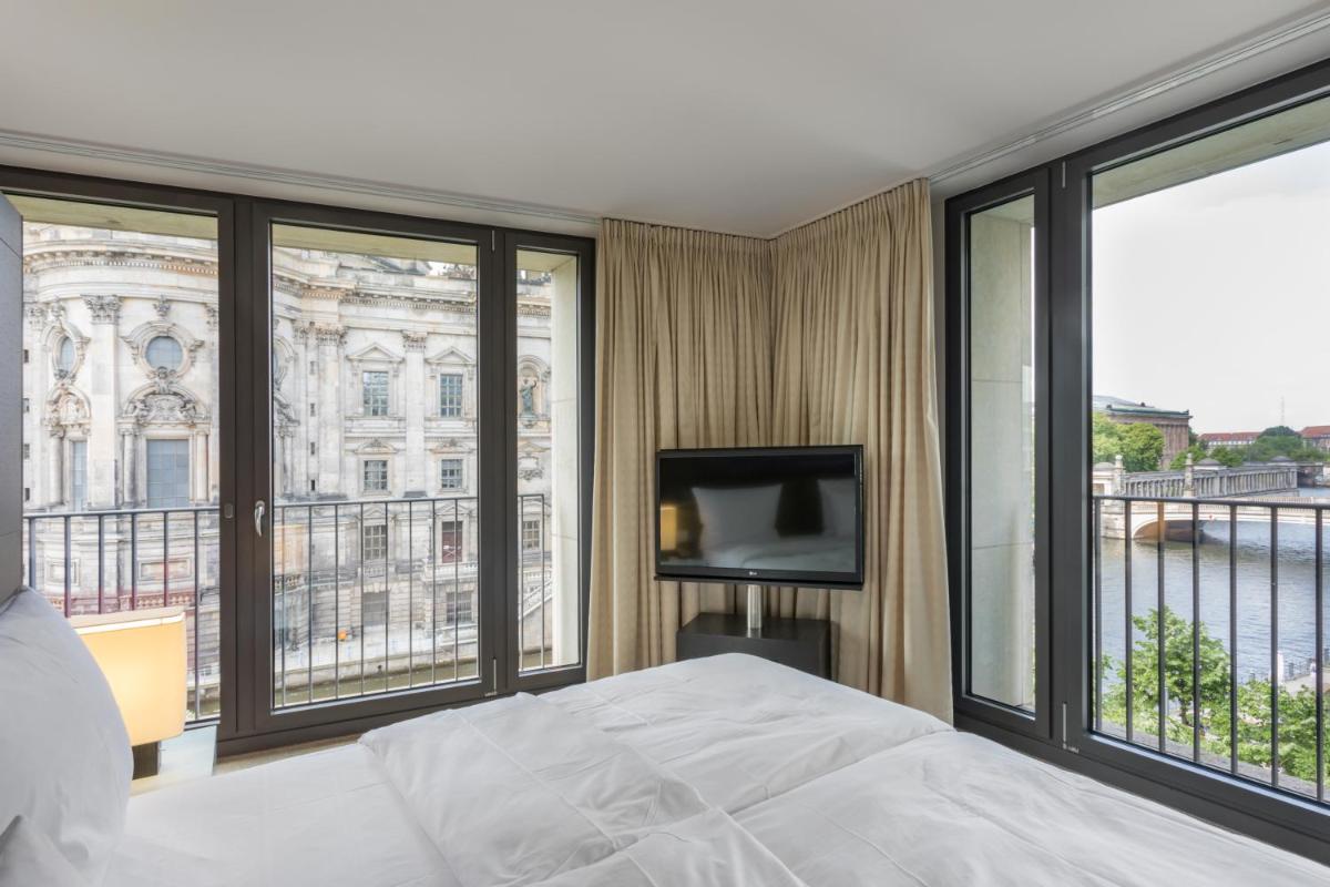 Ein Bett oder Betten in einem Zimmer der Unterkunft Radisson Collection Hotel, Berlin