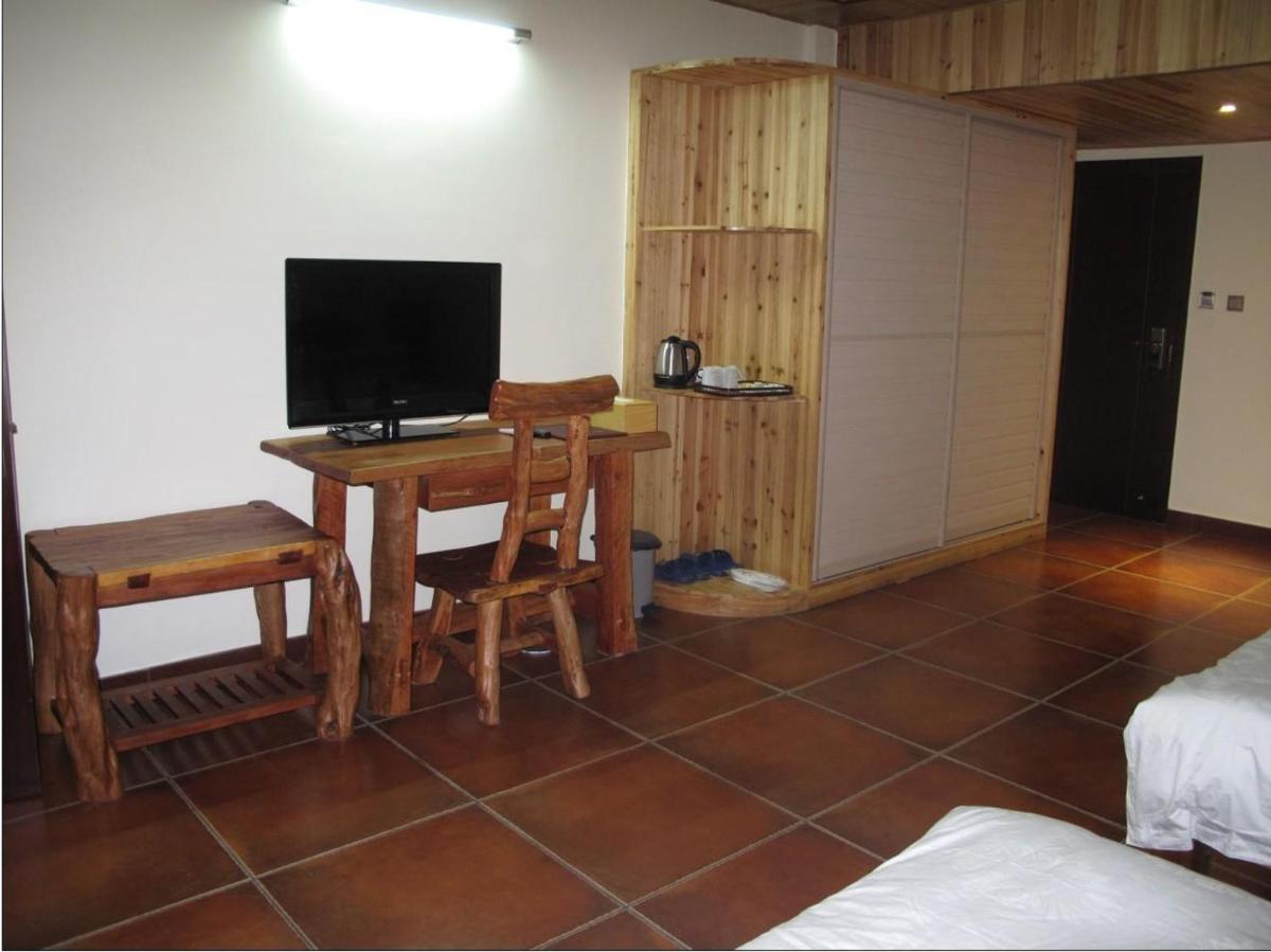 Longji Holiday Hotel - Housity