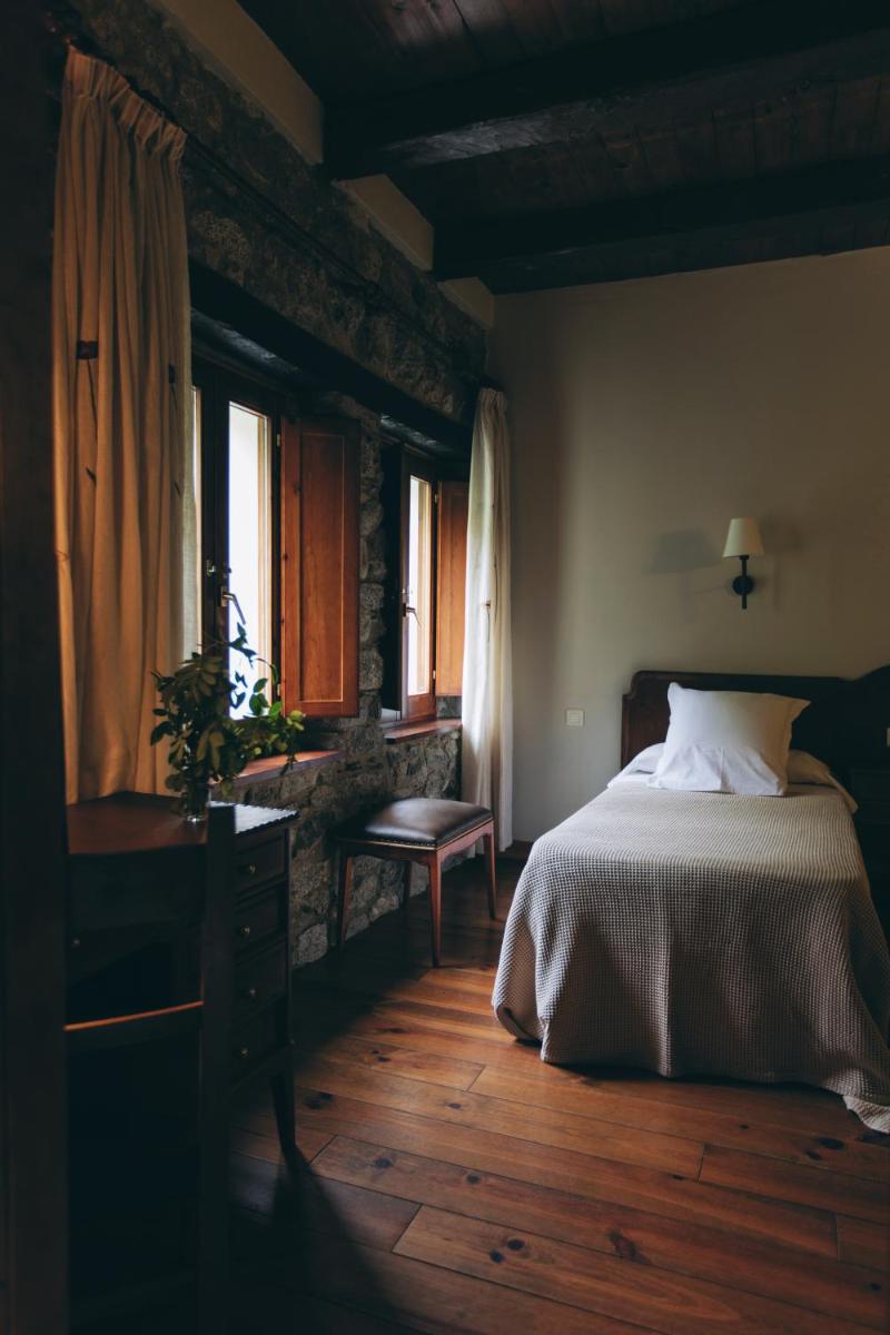 Cama o camas de una habitación en Hotel Caldas