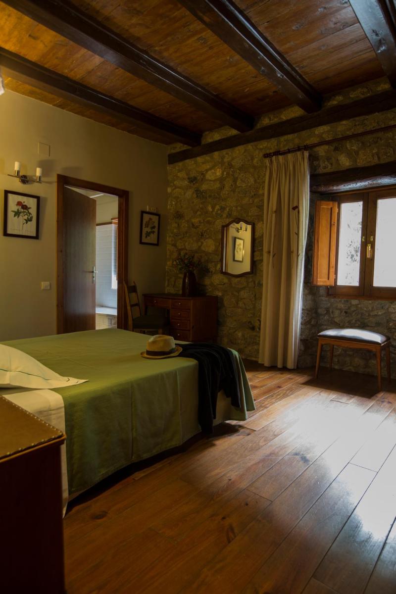 Cama o camas de una habitación en Hotel Caldas