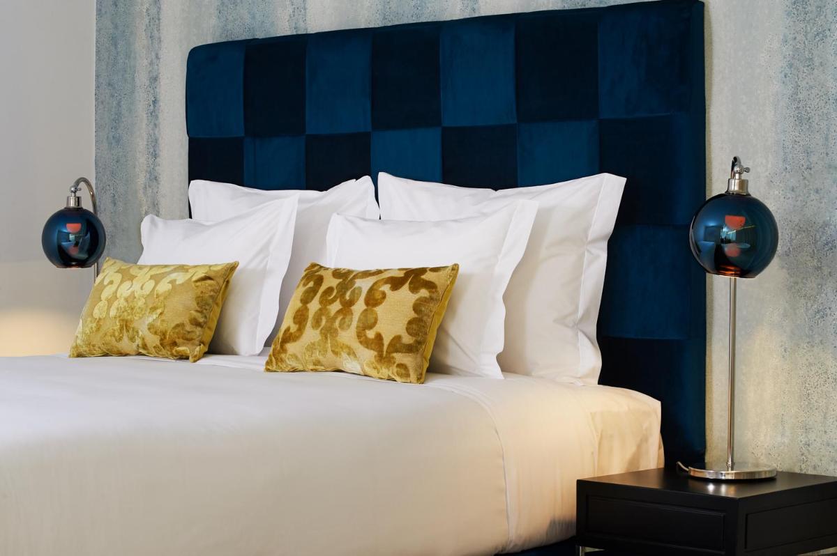 Uma cama ou camas num quarto em Convento do Seixo Boutique Hotel & Spa