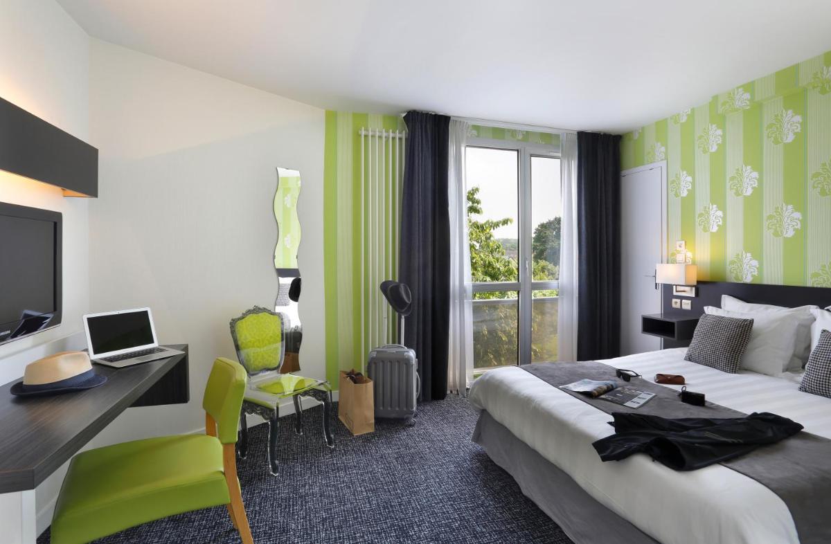 Un ou plusieurs lits dans un hébergement de l'établissement Altos Hotel & Spa