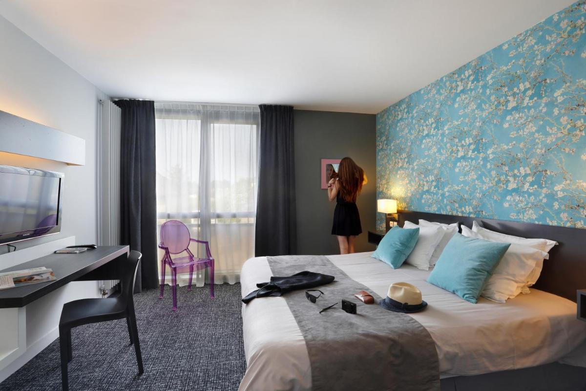 Télévision ou salle de divertissement dans l'établissement Altos Hotel & Spa