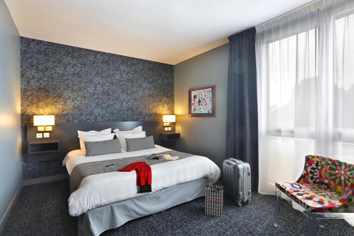 Un ou plusieurs lits dans un hébergement de l'établissement Altos Hotel & Spa