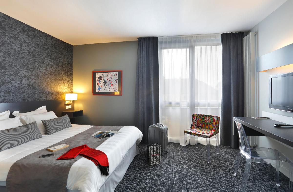 Télévision ou salle de divertissement dans l'établissement Altos Hotel & Spa