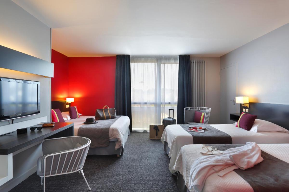 Un ou plusieurs lits dans un hébergement de l'établissement Altos Hotel & Spa