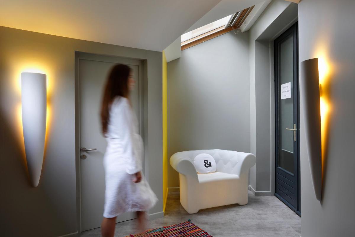 Coin salon dans l'établissement Altos Hotel & Spa