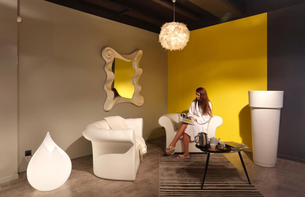 Coin salon dans l'établissement Altos Hotel & Spa