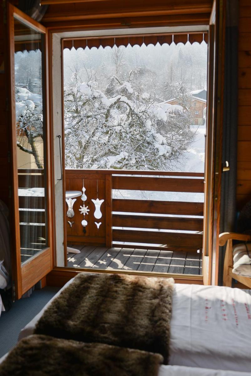 Un ou plusieurs lits dans un hébergement de l'établissement Café-Hôtel Le Morillon, Domaine du Grand Massif-Samoëns