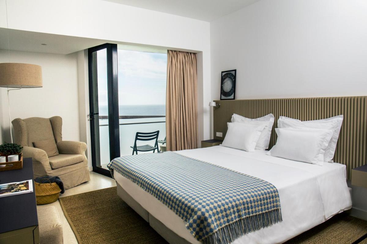 Uma cama ou camas num quarto em Memmo Baleeira - Design Hotels