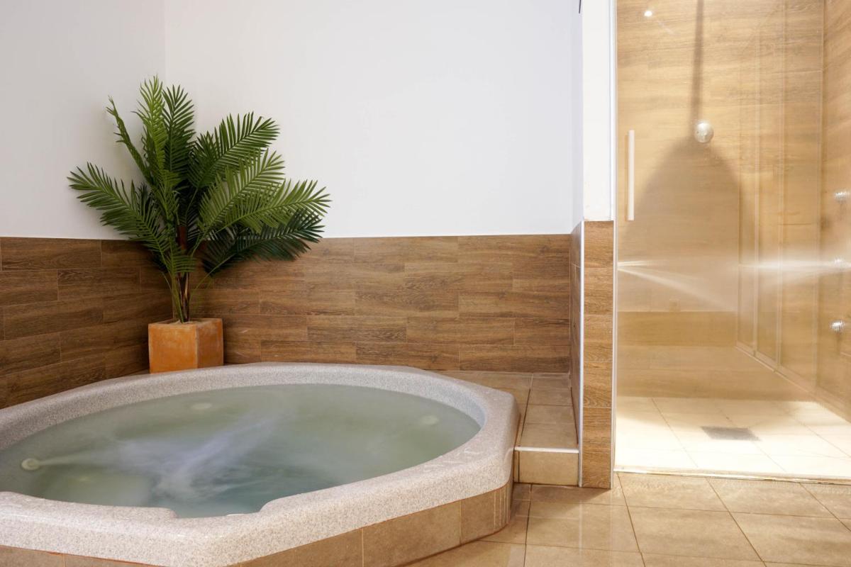 Un baño de Houm Plaza Son Rigo