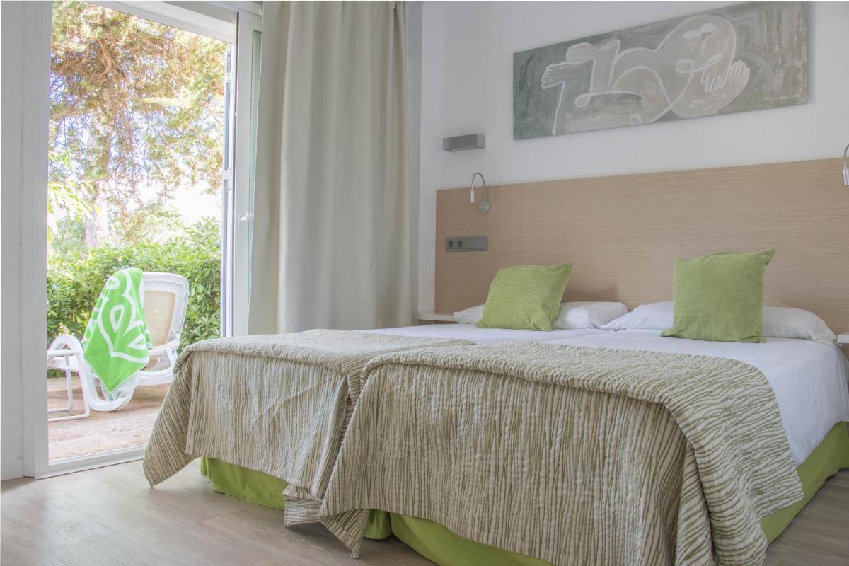 Cama o camas de una habitación en Houm Plaza Son Rigo