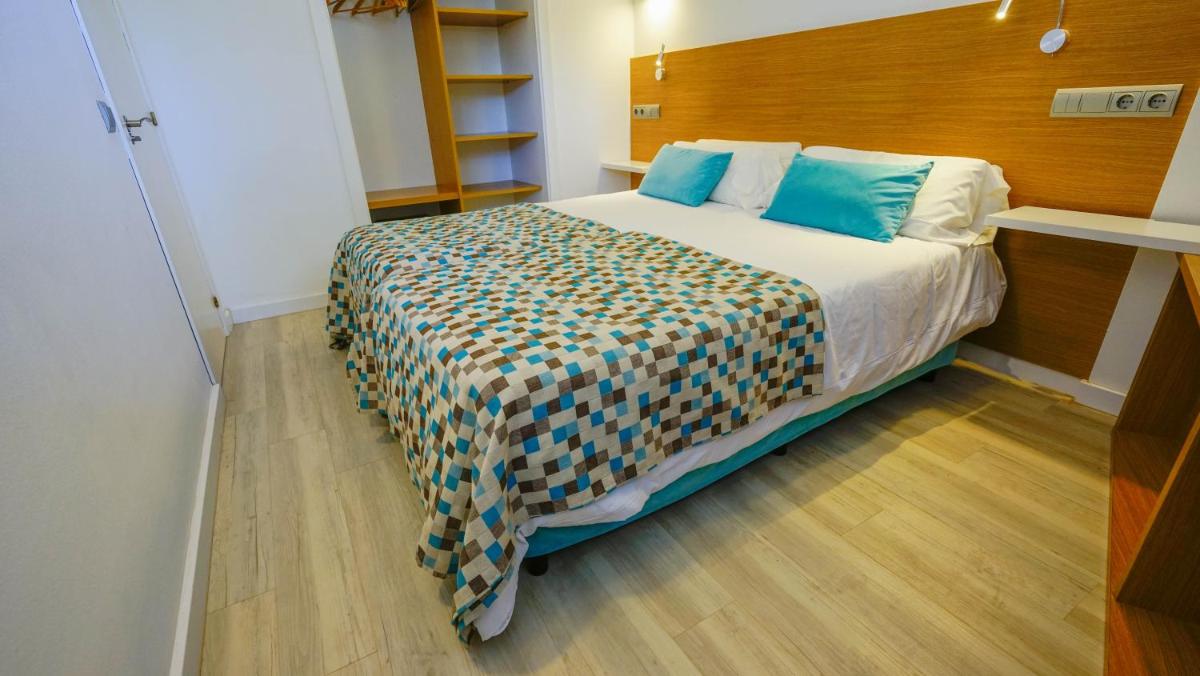 Cama o camas de una habitación en Houm Plaza Son Rigo
