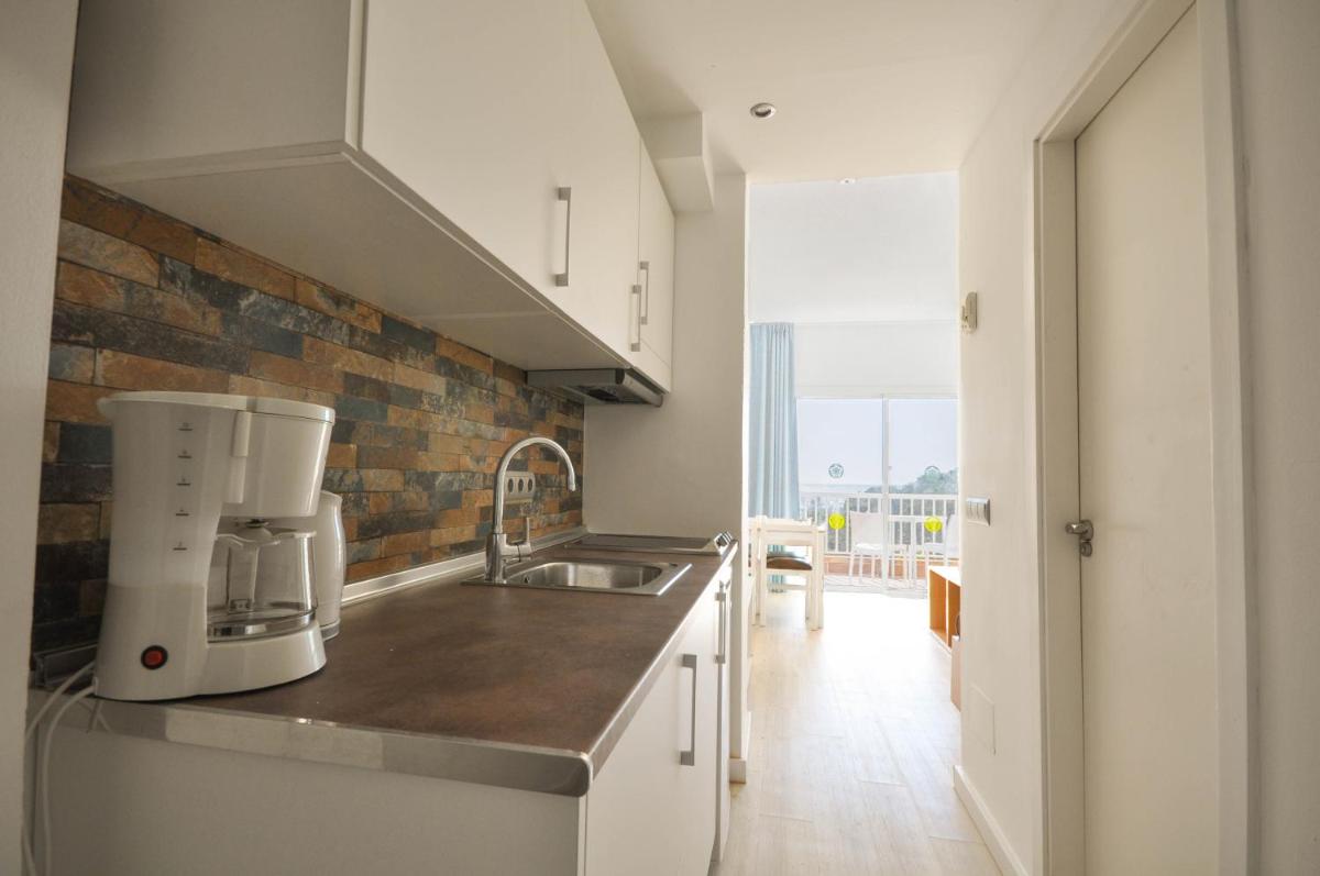 Una cocina o zona de cocina en Houm Plaza Son Rigo
