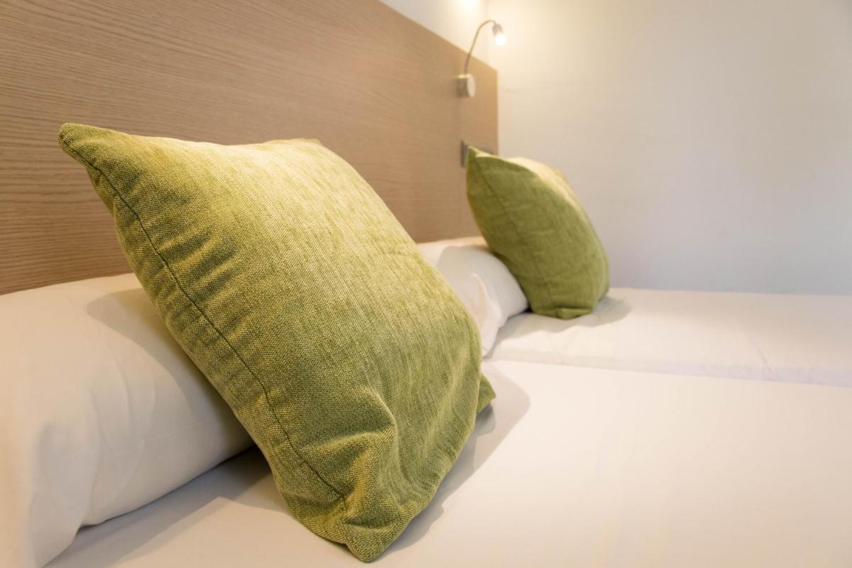 Cama o camas de una habitación en Houm Plaza Son Rigo