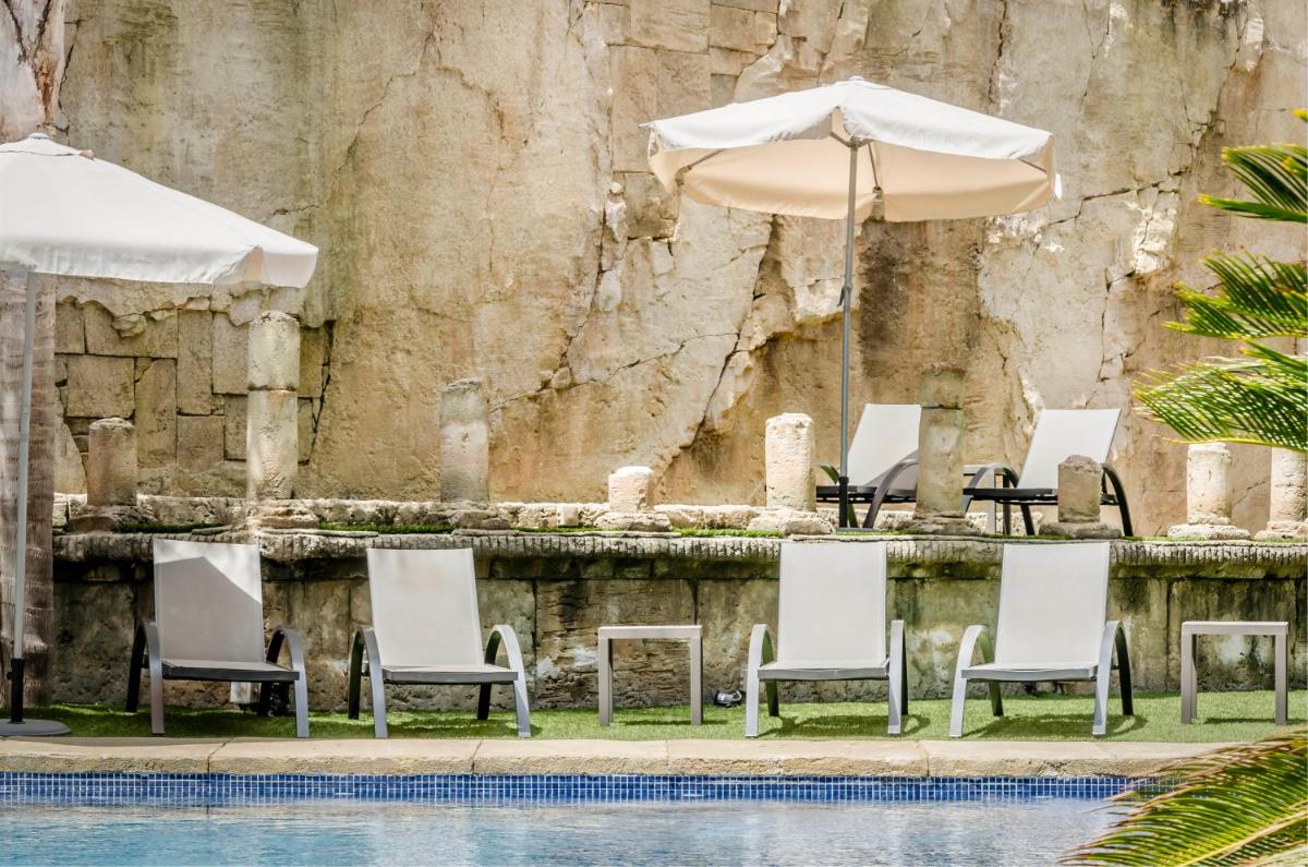 Piscina en o cerca de Exe Cunit Suites & Spa