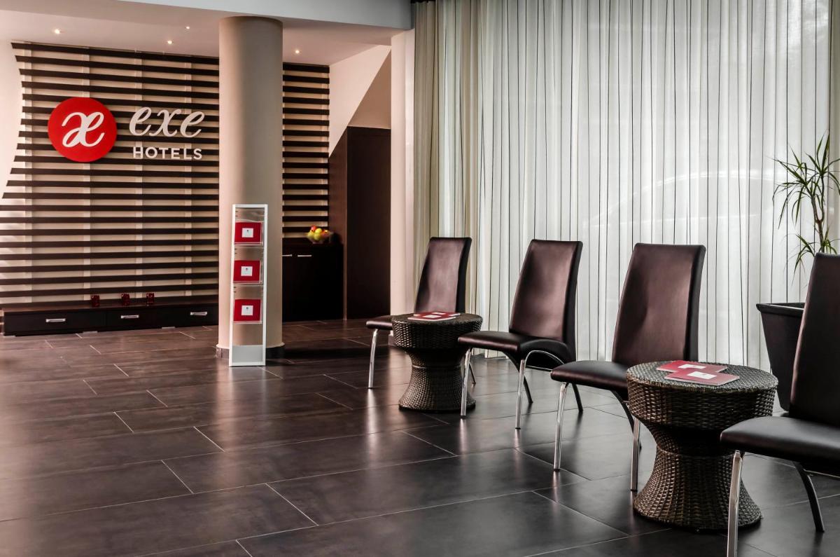 Zona de estar de Exe Cunit Suites & Spa
