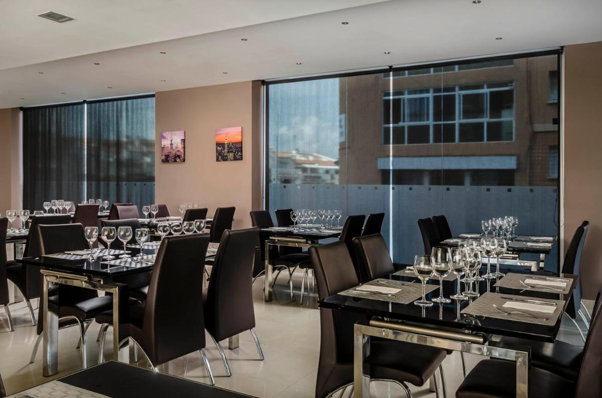 Zona de estar de Exe Cunit Suites & Spa