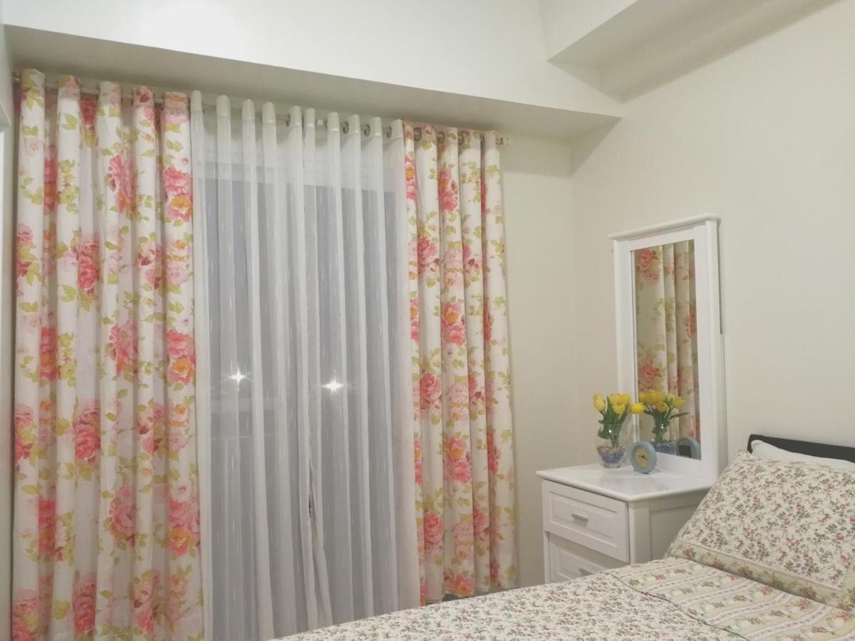 Cozy Condo at Wind Residences - Housity