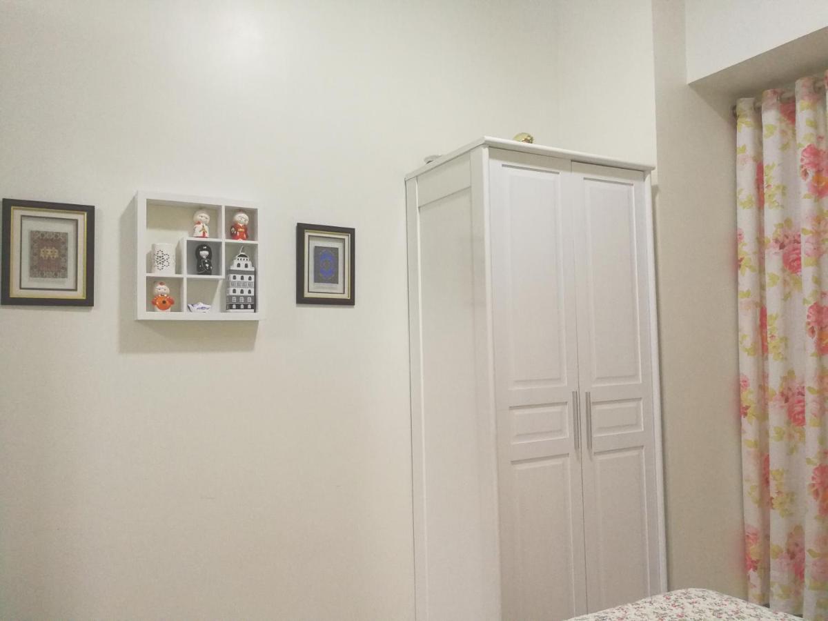Cozy Condo at Wind Residences - Housity