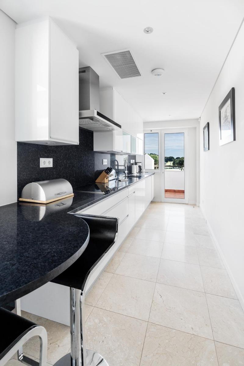 A cozinha ou kitchenette de As Cascatas Golf Resort & Spa