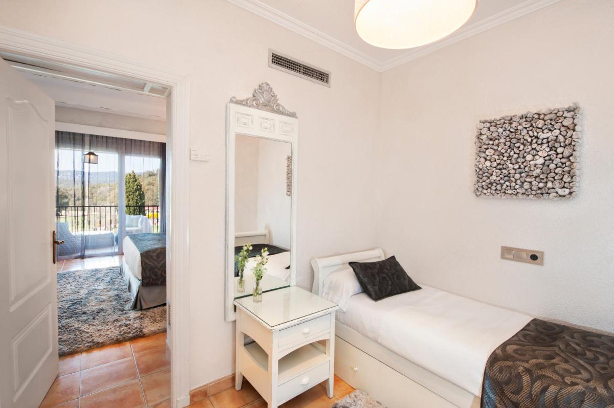 Cama o camas de una habitación en Mas Tapiolas